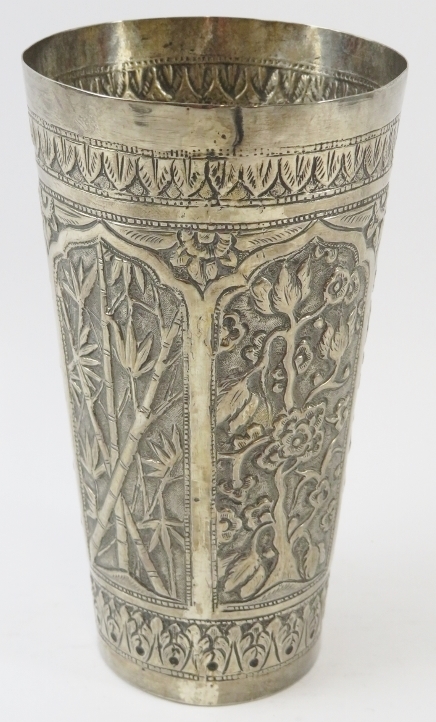 A Far Eastern hand decorated white metal beaker with floral and bamboo panels. Height 14.5cm. - Image 2 of 3