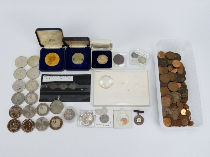 A collection of British and World coins. Notable coins included a Maria Theresa Thaler, three rare