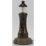 A vintage Cornish serpentine lighthouse table lamp. Turned and polished with an unpolished