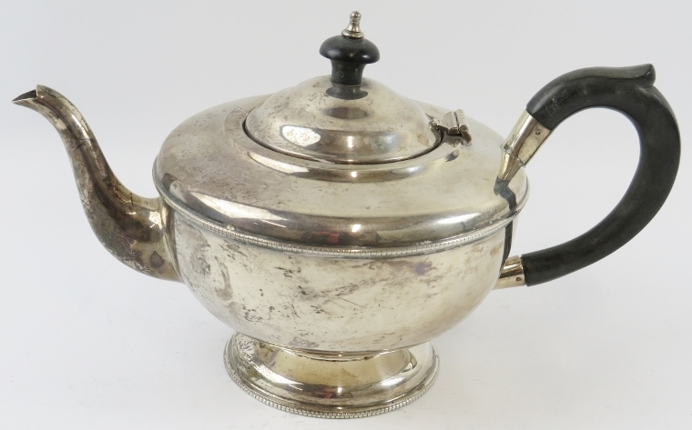 A 1930s silver teapot with ebony handle and finial. Hallmarked for Birmingham 1933, maker's mark - Image 2 of 3