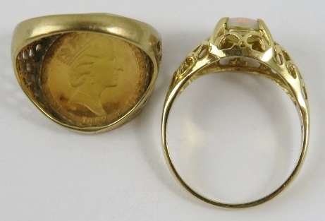 A 1/20 ounce fine gold angel coin inset to a signet ring mount in 9ct yellow gold; and yellow - Image 2 of 2