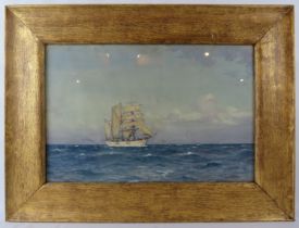 Ernest Dade (1868 - 1936) - A framed & glazed watercolour, 'Ship at sea with full sail', signed