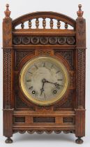 A Victorian Hogg & Shaw of Manchester oak mantel clock. Pendulum and key included. 37.5 cm height,