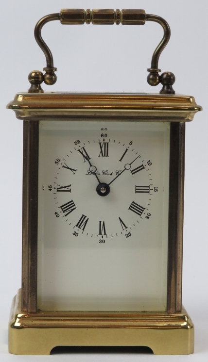 A London Clock Company brass carriage clock, 20th century. Dial signed ‘London Clock Co’.