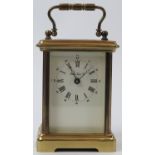 A London Clock Company brass carriage clock, 20th century. Dial signed ‘London Clock Co’.