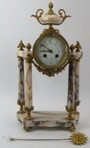 A French Louis XVI style gilt metal and marble portico mantel clock, late 19th/early 20th century.