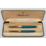 A vintage Parker 61 fountain pen and propelling pencil, circa 1960s. Vista blue with 12ct rolled