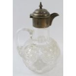 A late Victorian silver mounted cut glass claret jug, hobnail cut with gothic crosses. Hallmarked