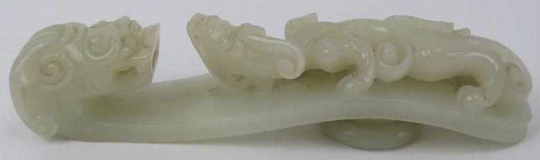 A Chinese celadon jade dragon belt hook, 18th/19th century. Finely carved depicting a chilong dragon - Image 2 of 8