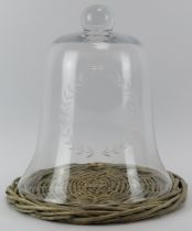 A large engraved glass cheese bell. Engraved with a laurel wreath. 34 cm height, 29.8 cm diameter.