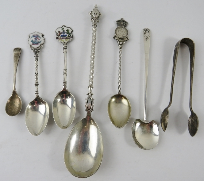 Mixed lot of silver spoons and sugar tongs including Queen Victoria Jubilee, Arts & Crafts and