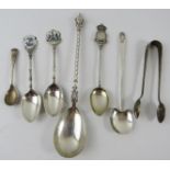 Mixed lot of silver spoons and sugar tongs including Queen Victoria Jubilee, Arts & Crafts and