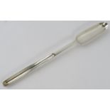 George III silver marrow scoop with engraved griffin crest. Hallmarks rubbed. Length 20.5cm, gross