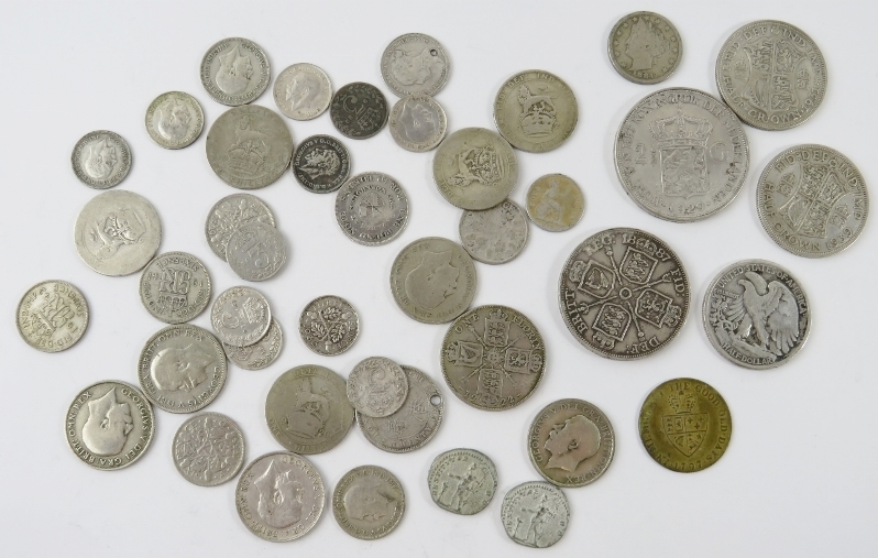 A quantity of mainly British, Dutch and US silver coins within a Damascene enamel decorated - Image 3 of 3