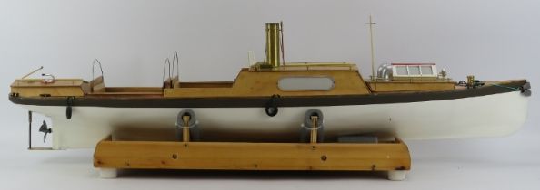 Toys and Models: An RC steam pleasure cruiser model boat. With a painted white and grey hull and