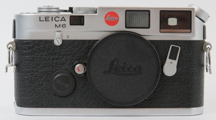 A Leica M6 silver chrome finish rangefinder camera body. Box, carry strap and instructions included.