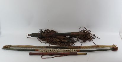 Tribal Art: Two African bows and two sheaths with arrows. 116.5 cm longest length. Condition report: