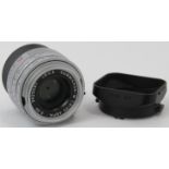 A Leica Summicron-M 1:2 35mm ASPH camera lens with hood. Leica pouch included. Serial number: