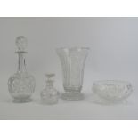 Four clear cut crystal glass wares, 20th century. Comprising a decanter by Thomas Webb together with