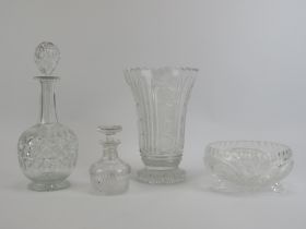 Four clear cut crystal glass wares, 20th century. Comprising a decanter by Thomas Webb together with