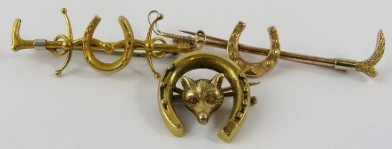 Equestrian interest: three stock or tie pin brooches, two styled as hunting crops and horseshoe,