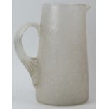 A large cracked ice glass jug, late 19th/early 20th century. Modelled with a reeded loop handle.