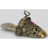 A Peruvian embossed plated brass ladies stirrup, 18th/19th century. Of slipper form, decorated
