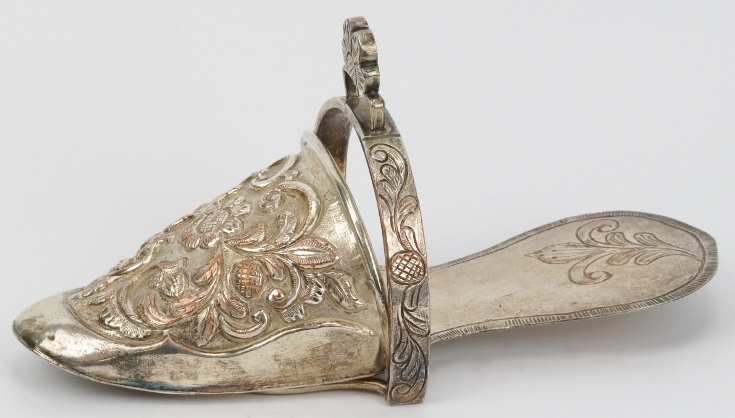 A Peruvian plated copper ladies stirrup, 19th century. Of slipper form, repoussé decorated with - Image 2 of 4