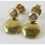A pair of round brilliant cut diamond and 9ct yellow gold earrings, total diamond weight 0.06cts
