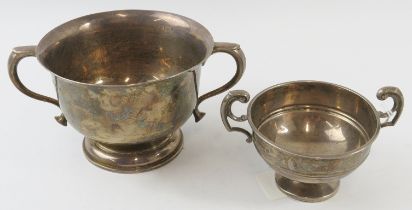 Two silver handled bowls, largest 15cm wide. Hallmarked for Sheffield 1932 & 1935. Gross combined