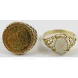 A 1/20 ounce fine gold angel coin inset to a signet ring mount in 9ct yellow gold; and yellow