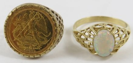 A 1/20 ounce fine gold angel coin inset to a signet ring mount in 9ct yellow gold; and yellow