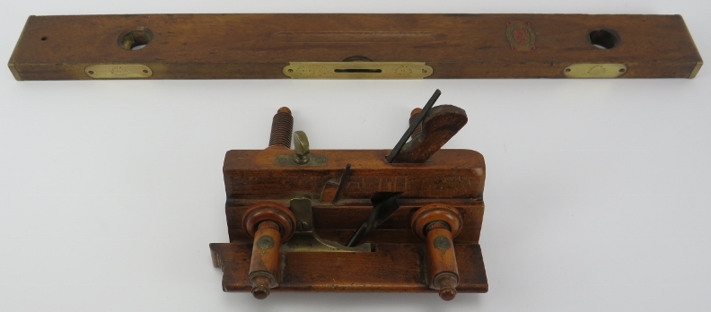 An antique plough plane and Wilson Lovatt & Sons spirit level. Spirit level: 76 cm length. (2