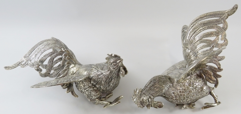 A pair of Middle Eastern white metal fighting cockerel figures, each bearing a .900 mark in - Image 2 of 4