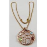 A multi-gem cabochon set ‘bubble’ pendant in precious rose gold, to include topaz, tourmaline,