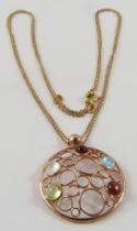 A multi-gem cabochon set ‘bubble’ pendant in precious rose gold, to include topaz, tourmaline,