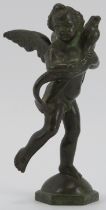 An Italian bronze sculpture of a cherub carrying a dolphin after Andrea del Verrocchio, 19th