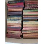 A collection of late 19th/early 20th century classic books including Dickens, Hardy, Bronte, Trolope