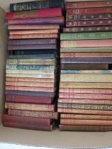 A collection of late 19th/early 20th century classic books including Dickens, Hardy, Bronte, Trolope