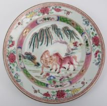 A Chinese famille rose polychrome enamelled porcelain plate, 18th century, Qianlong period.