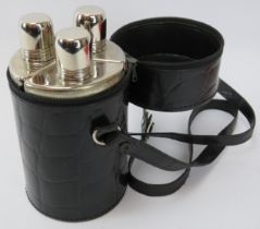 A vintage leather cased set of three travelling spirit flasks with chromes metal mounts. 18.6 cm