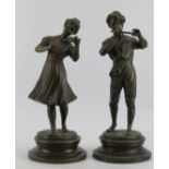 A pair of Italian bronze figures depicting a girl with violin and boy with flute, signed Lancini,