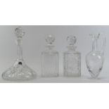 Four cut crystal glass decanters, 20th century. (4 items) 29 cm tallest height. Condition report: