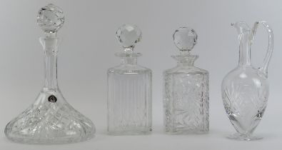 Four cut crystal glass decanters, 20th century. (4 items) 29 cm tallest height. Condition report: