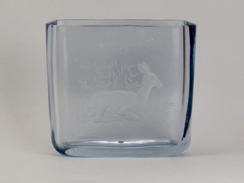A Strombergshyttan Swedish ice coloured crystal glass vase engraved with a recumbent deer, 20th