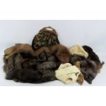 A group of vintage furs and a ladies needlework handbag. (12 items) Handbag: 36 cm approximate