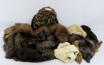 A group of vintage furs and a ladies needlework handbag. (12 items) Handbag: 36 cm approximate