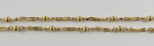 A 9ct yellow gold fancy link neckchain with alternating ribbed bead and open twisted links, - Image 2 of 2