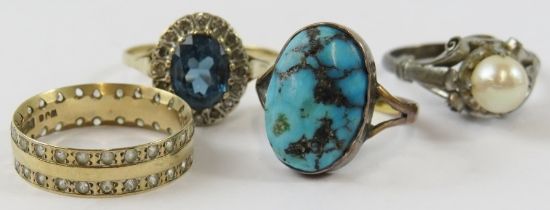 A 9ct yellow gold ring set with a turquoise bead; a blue topaz and diamond cluster ring; a pearl