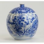 A Japanese blue and white porcelain vase, late Meiji/Taisho period. Of bulbous form, the exterior